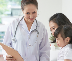 pediatrician showing prescription